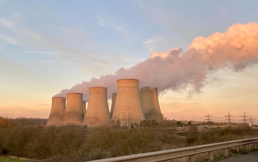 power plant burning fossil fuels causing bad environmental iimpact